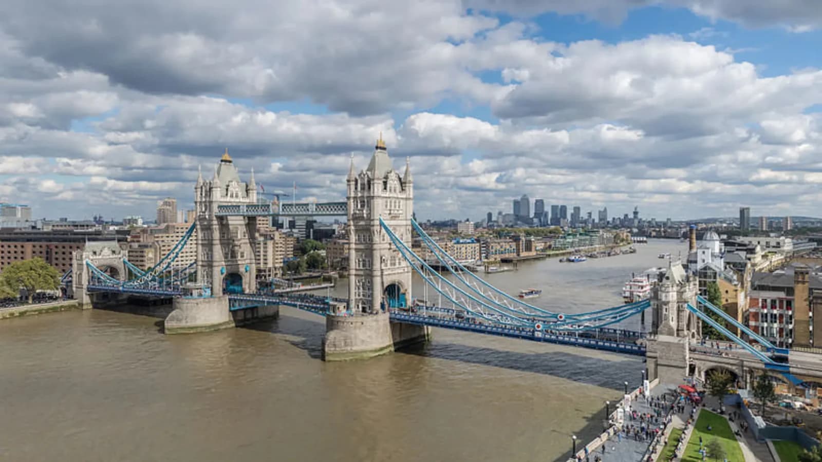 London skyline at dusk with Tower Bridge, seen from across the Thames