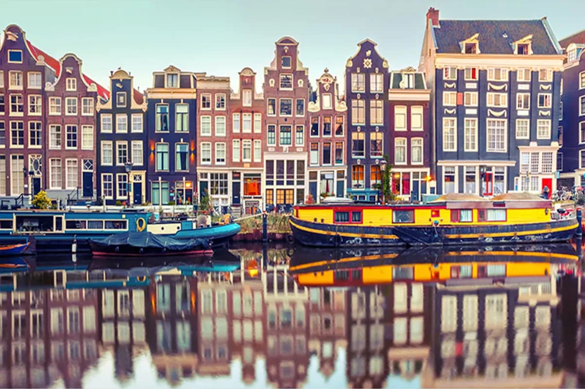 Amsterdam canal houses and bicycles in the morning light, Netherlands